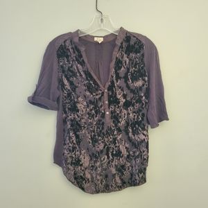 Tiny three quarter sleeve shirt.